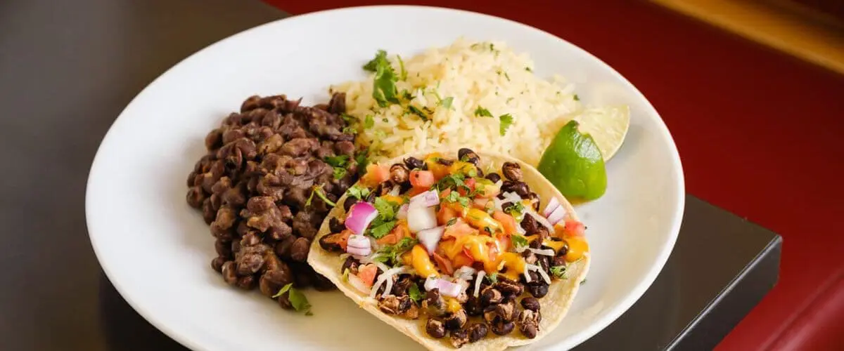 Plate of rice, beans and tostada