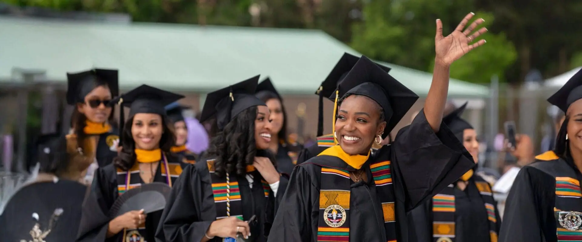 Students celebrating graduation