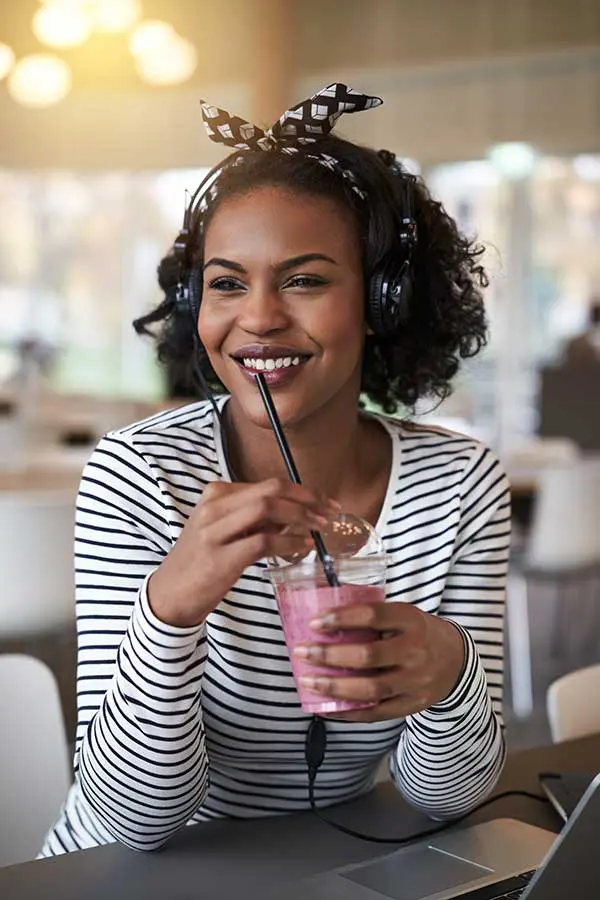 Student drinking a smoothie